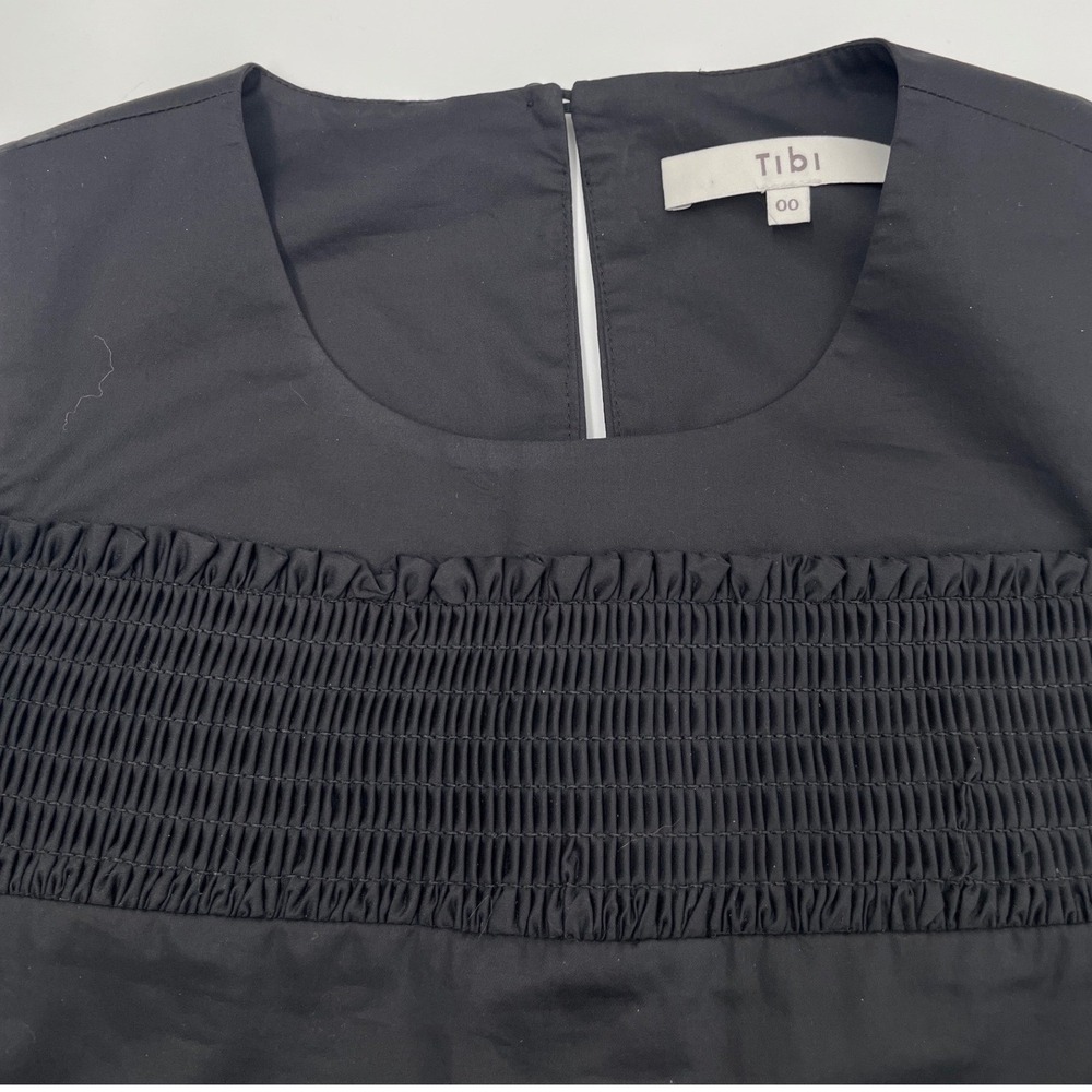 Tibi Black Cotton Smocked Cold Shoulder Peplum Top Minimalist Quiet Luxury Sz 00 - Picture 4 of 8